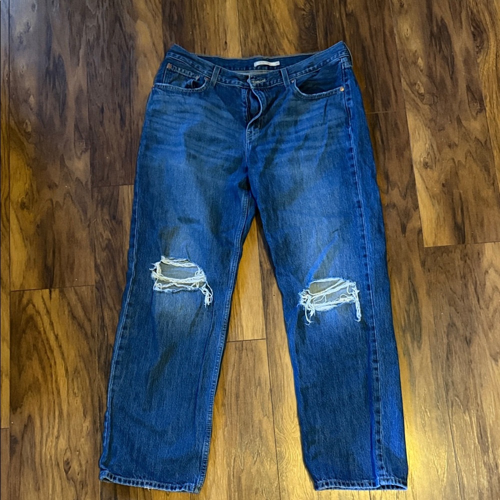 Levi's Relaxed Fit Blue Jeans with Distressed Knees